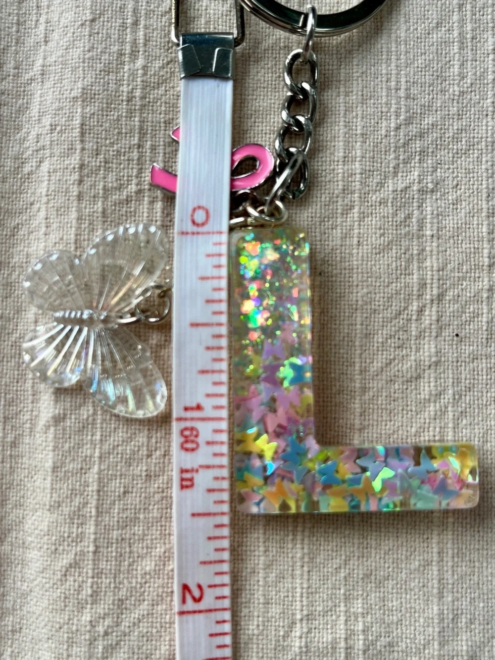 🦋 'L' Glitter Letter Keychain & Bag Charm with 🎀 Bow & Butterfly Accents